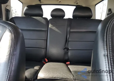 2005 Ford Escape Limited z USA, uszkodzony, nr VIN 1FMYU04195KB68172